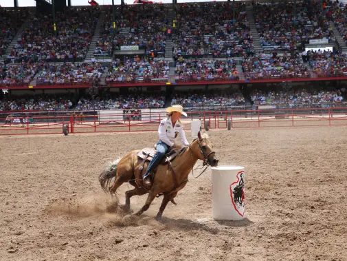 cheyenne-frontier-days-barrel-race--laramie-county---3---wyoming-office-of-tourism.JPG